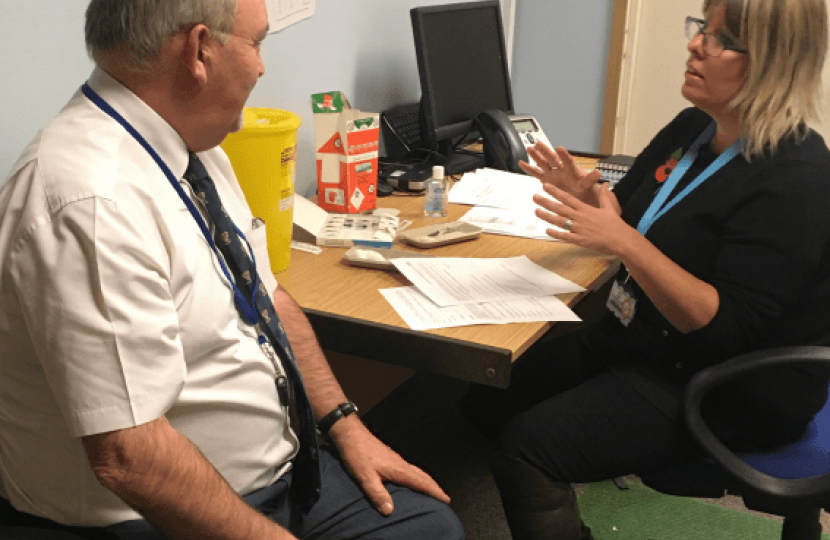 Councillor Jarrett receiving his flu vaccination 