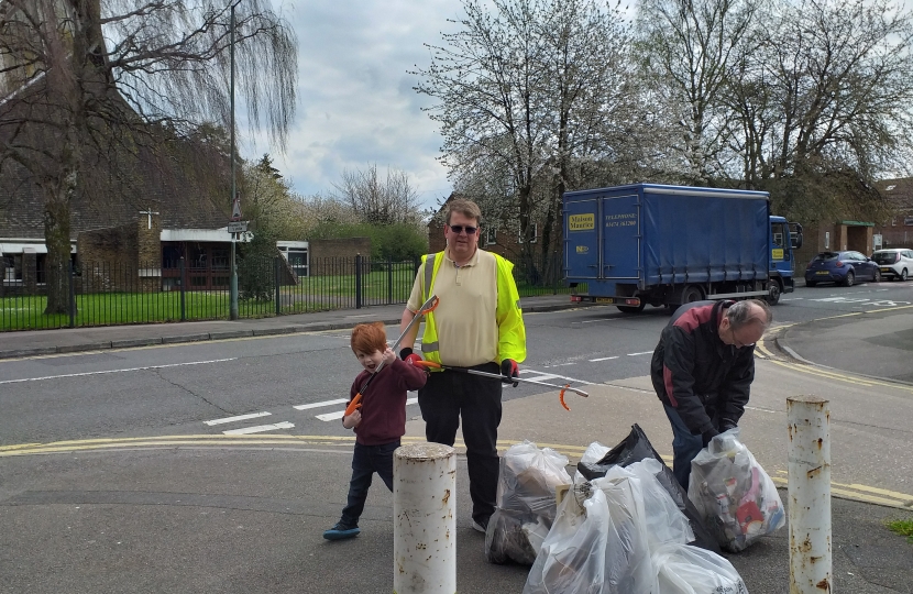 Councillor Joy and his son at the Twydall Spring Clean Event