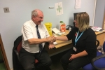 Councillor David Brake receiving his flu vaccination 