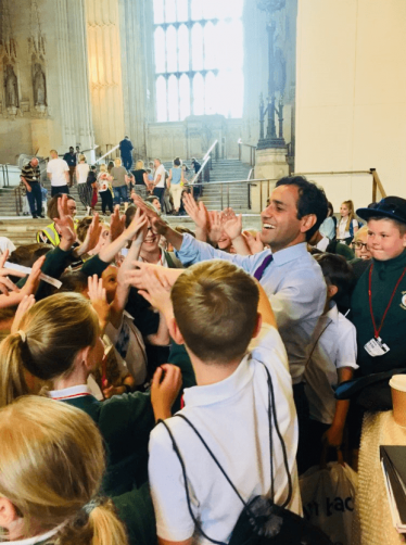 Rehman Chishti high-fives children visiting parliament